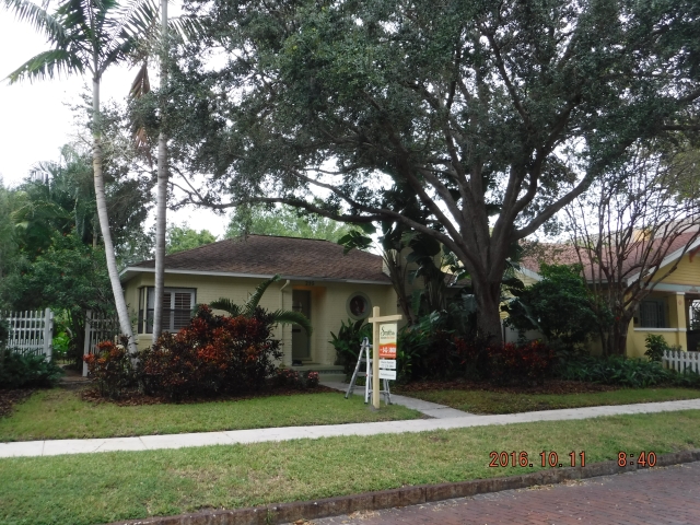 Exterior risk photo report example showing full front elevation